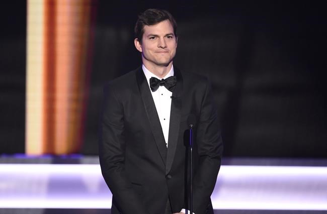 FILE - In this Jan. 29, 2017 file photo, actor and entrepreneur Ashton Kutcher appears at the 23rd annual Screen Actors Guild Awards in Los Angeles. Iowa Gov. Kim Reynolds said Thursday, April 23, 2020 that the state's $26 million contract with Utah companies to increase coronavirus testing was developed after she got unsolicited advice from Iowa native Kutcher. (Photo by Chris Pizzello/Invision/AP File)