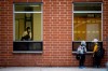Children wait outside Elizabeth B. Phin Public School ahead of their first day of classes in Pickering, Ont., Tuesday, Sept. 8, 2020. THE CANADIAN PRESS/Cole Burston