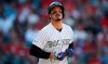 FILE - In this Sept. 12, 2019, file photo, Colorado Rockies' Nolan Arenado reacts after being put out against the St. Louis Cardinals in the eighth inning of a baseball game in Denver. Arenado, the Rockies' top player, is at odds with the team's management as spring training opens for the club. (AP Photo/David Zalubowski, File)