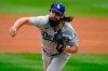 Los Angeles Dodgers starting pitcher Tony Gonsolin works against the Colorado Rockies in the first inning of a baseball game Sunday, Sept. 20, 2020, in Denver. (AP Photo/David Zalubowski)