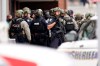 Police outside a King Soopers grocery store where a shooting took place Monday, March 22, 2021, in Boulder, Colo. (AP Photo/David Zalubowski)