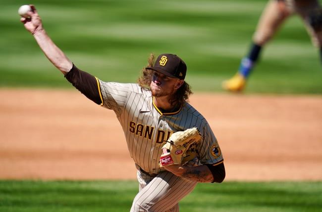 San Diego Padres starting pitcher Chris Paddack works against the Colorado Rockies in the third inning of a baseball game Sunday, Aug. 30, 2020, in Denver. (AP Photo/David Zalubowski)