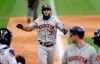 Houston Astros' Abraham Toro celebrates as he crosses home plate after hitting a three-run home run off Colorado Rockies starting pitcher German Marquez in the fifth inning of a baseball game Thursday, Aug. 20, 2020, in Denver. (AP Photo/David Zalubowski)