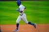 Los Angeles Dodgers' Chris Taylor runs the bases on a solo home run off Colorado Rockies starting pitcher Chi Chi Gonzalez during the fourth inning of a baseball game Saturday, Sept. 19, 2020, in Denver. (AP Photo/David Zalubowski)
