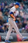 New York Mets starting pitcher Jacob deGrom reacts after giving up a solo home run to Colorado Rockies' Raimel Tapia during the fifth inning of the first baseball game of a doubleheader Saturday, April 17, 2021, in Denver. (AP Photo/David Zalubowski)