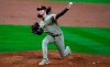 San Diego Padres relief pitcher Matt Strahm works against the Colorado Rockies during the sixth inning of a baseball game Friday, Aug. 28, 2020, in Denver. San Diego won 10-4. (AP Photo/David Zalubowski)