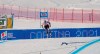 FILE - In this Jan. 20, 2019 file photo, Liechtenstein's Tina Weirather speeds down the course as a banner advertising the ski world championships in Cortina d'Ampezzo is seen in background, during an alpine ski, women's World Cup super-G in Cortina D'Ampezzo, Italy. The natural beauty of Cortina will be of special importance at the alpine ski World championships, with organizers hoping that the images from the slopes beamed around the globe to TV viewers will make up for the lack of fans amid the coronavirus pandemic. (AP Photo/Giovanni Auletta, File)