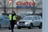 SHANNON VANRAES / WINNIPEG FREE PRESS
Members of the Winnipeg Police Service direct traffic in front of the St. James Costco store on Black Friday.