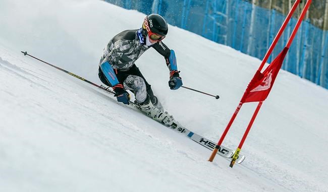 FILE - Max Bervy makes turns on the newly-opened Gold Peak Competition Center in Vail, Colo., in this Nov. 20, 2017, file photo. Two-time Olympic champion Ted Ligety was Bervy’s idol growing up. The World Pro Ski Tour starts the season this weekend with a pair of races in Steamboat Springs, Colorado. The person you're competing against could be a national team member, World Cup competitor, college standout, journeyman or even two-time Olympic champion Ted Ligety, who’s been known to make an appearance in the field. (Chris Dillmann/Vail Daily via AP, File)