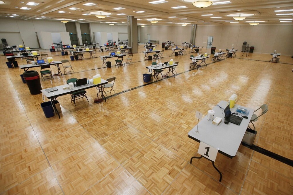 CP
Only a few of the more than two-dozen immunization stations were being used at the covention centre in Winnipeg on Monday, says a nurse who received the vaccine. (John Woods / The Canadian Press files)