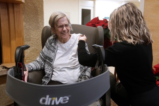 CPMargaret Watson, 94, a resident at Oakview Place Long Term Care Residence, is all smiles after getting her COVID-19 vaccine. (John Woods / The Canadian Press)