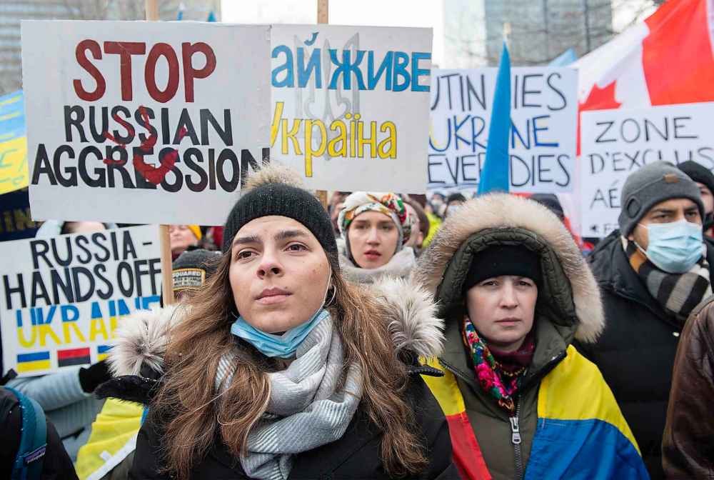 The Canadian Press
People take part in a rally in support of Ukraine in Montreal, Sunday, February 27, 2022. (Graham Hughes / The Canadian Press)