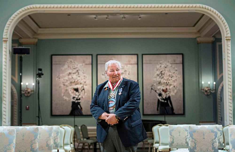 Justice Murray Sinclair, who was Manitoba’s first Indigenous judge, led the Truth and Reconciliation Commission and served as a senator, stands in the ballroom at Rideau Hall after being invested as a companion of the Order of Canada and receiving a Meritorious Service Decoration (Civil Division), in Ottawa, on Thursday, May 26, 2022. THE CANADIAN PRESS/Justin Tang