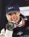 Winner Mikael Kingsbury, of Canada, celebrates on the podium following the men's skiing moguls world championships Friday, Feb. 8, 2019, in Park City, Utah. Kingsbury earned his 62nd World Cup victory Saturday, winning the gold medal in the men's moguls event. THE CANADIAN PRESS/AP/Rick Bowmer