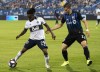 Vancouver Whitecaps forward Yordi Reyna controls the ball away from Montreal Impact defender Jukka Raitala during first half MLS action in Montreal on Wednesday, August 28, 2019. THE CANADIAN PRESS/Paul Chiasson