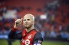 Toronto FC midfielder Michael Bradley (4) gives thumbs up to the crowd following their victory against the Atlanta United during MLS soccer action in Toronto, Sunday, Oct. 28, 2018. Toronto FC has confirmed captain Bradley is returning next season after signing a new deal. THE CANADIAN PRESS/Cole Burston