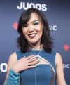 Kelly Fraser arrives on the red carpet at the Juno Awards in Vancouver, Sunday, March, 25, 2018. Inuk singer Fraser, whose popular YouTube cover of Rihanna helped inspire a Juno-nominated career of songwriting and activism, has died at 26. THE CANADIAN PRESS/Darryl Dyck