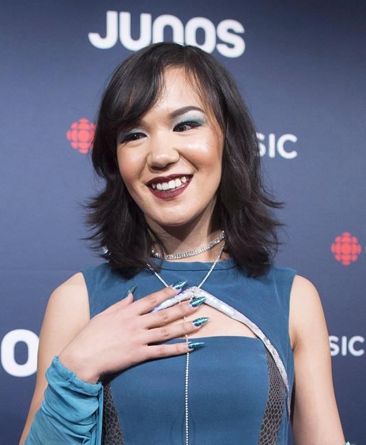 Kelly Fraser arrives on the red carpet at the Juno Awards in Vancouver, Sunday, March, 25, 2018. Inuk singer Fraser, whose popular YouTube cover of Rihanna helped inspire a Juno-nominated career of songwriting and activism, has died at 26. THE CANADIAN PRESS/Darryl Dyck