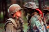 Canadian soldier Patrick Cloutier and Saskatchewan native Brad Laroque come face-to-face in a tense standoff at the Kahnesatake reserve in Oka, Que., Saturday September 1, 1990. The ghosts of Indigenous protests past have hovered over Prime Minister Justin Trudeau as his government struggles to bring a peaceful end to blockades that have disrupted traffic on rail lines and other major transportation routes across the country for more than two weeks. THE CANADIAN PRESS/ Shaney Komulainen