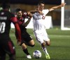 Ottawa Fury FC's Chris Mannella (5) battles for the ball with Toronto FC's Jay Chapman (14) during second half Canadian Championship soccer action in Ottawa on Wednesday, July 18, 2018. York 9 FC has signed former Toronto FC homegrown player Mannella. The 25-year-old midfielder from Toronto switches to the Canadian Premier League after two seasons with Ottawa Fury FC of the United Soccer League.THE CANADIAN PRESS/Justin Tang