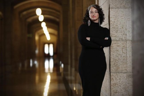 Nahanni Fontaine, an NDP MLA who shared her story of sexual abuse, is photographed at the Manitoba Legislature, in Winnipeg on Tuesday, November 15, 2016. A Manitoba legislator is calling on Canadians to contact the federal heritage minister to remove two poems, written by the killer of an Indigenous woman, from the Parliamentary Poet Laureate website. Fontaine says in a series of tweets that the inclusion of poems by Stephen Brown, including one about a prostitute, constitutes 