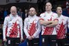 Canada skip Kevin Koe, third B.J. Neufeld, second Colton Flasch, lead Ben Hebert, left to right, stand on the podium after losing to Sweden in the gold medal game at the Men's World Curling Championship in Lethbridge, Alta. on Sunday, April 7, 2019. The Kevin Koe curling team has split with second Flasch. Flasch won a Canadian title and world championsihp silver medal with Koe in 2019.THE CANADIAN PRESS/Paul Chiasson
