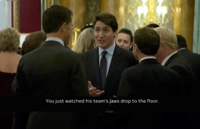 In this grab taken from video on Tuesday, Dec. 3, 2019, Canada's Prime Minister Justin Trudeau, centre, gestures as he speaks during a NATO reception. (Host Broadcaster via AP)