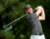 Graham DeLaet watches his tee shot on the fifth hole during the second round of the PGA Championship golf tournament at the Quail Hollow Club Friday, Aug. 11, 2017, in Charlotte, N.C. DeLaet has withdrawn from the PGA Tour's Farmers Insurance Open with a back injury, a familiar issue for the Canadian golfer. THE CANADIAN PRESS/AP/Chuck Burton