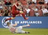 Toronto FC midfielder Jacob Shaffelburg (24) leaps over New York Red Bulls defender Tim Parker (26) during first half MLS Soccer action in Toronto on Wednesday, July 17, 2019. Canada soccer coach John Herdman has called up six newcomers for a trio of international matches later this month. THE CANADIAN PRESS/Nathan Denette