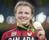 Canada's Erica Wiebe, from Stittsville, Ont., displays her gold medal after defeating Kazakhstan's Guzel Manyurova to win their 75kg gold medal match at the 2016 Summer Olympics in Rio de Janeiro, Brazil on Thursday, August 18, 2016. The International Olympic Committee's loosening of iron-fisted rules around sponsorship gives Canada's Olympians more commercial wiggle room in Tokyo this summer. Under pressure from athletes, the IOC now allows for a more liberal interpretation of rules that govern the way athletes engage with their personal sponsors during an Olympic Games. THE CANADIAN PRESS/Ryan Remiorz