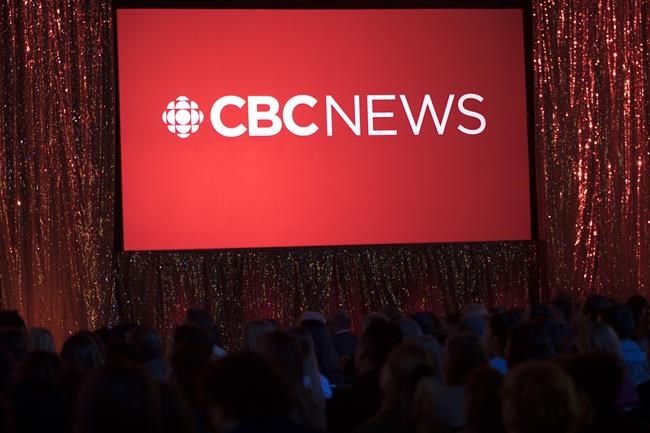 The CBC News logo is projected onto a screen during the CBC's annual upfront presentation at The Mattamy Athletic Centre in Toronto, Wednesday, May 29, 2019. The CBC is temporarily scrapping most of its local TV newscasts in response to the evolving COVID-19 crisis and putting the focus on coverage at CBC News Network. THE CANADIAN PRESS/Tijana Martin