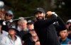 International team player Adam Hadwin of Canada tees off on the 12th hole in his singles match during the President's Cup golf tournament at Royal Melbourne Golf Club in Melbourne on December 15, 2019. dam Hadwin is learning to balance the responsibilities of being a father with the tough travel schedule of being a pro golfer. He’s playing in the Genesis Invitational this week, his third PGA Tour event since the birth of his daughter Maddox. THE CANADIAN PRESS/AP - Andy Brownbill