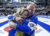 Alberta skip Chelsea Carey gets a hug from her coach and father Dan Carey after defeating Ontario 8-6 to win the Scotties Tournament of Hearts at Centre 200 in Sydney, N.S. on February 24, 2019. Chelsea Carey's coach and father apologized to an official for telling her to 