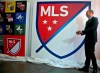 Major League Soccer Commissioner Don Garber launch the league's new logo during a press conference Thursday, Sept. 18, 2014, in New York. Major League Soccer has extended its moratorium on team training through March 27. The news comes one day after the league announced that, due to the COVID-19 outbreak, it was extending its suspension of play with May 10 a targeted return date. The league's original training moratorium was to have ended Friday. THE CANADIAN PRESS/AP, Bebeto Matthews