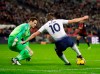 Bournemouth goalkeeper Asmir Begovic, left, makes a save in front of Tottenham's Harry Kane during the English Premier League soccer match between Tottenham Hotspur and Bournemouth at Wembley stadium in London, Wednesday, Dec. 26, 2018. Former Canadian under-20 goalkeeper Begovic has joined AC Milan on loan from England's Bournemouth through the end of June.THE CANADIAN PRESS/AP/Tim Ireland
