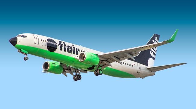 The tail section of a Flair Airlines plane is seen in this undated handout photo. Flair Airlines Ltd. is offering passengers an unlimited travel pass for three months amid rising competition between budget carriers. The flight pass costs $700 and opens the gate to limitless domestic flights between Feb. 13 and May 13. A $500 version has some blackout dates and excludes flights on Fridays and Sundays. THE CANADIAN PRESS/HO, Flair Airlines *MANDATORY CREDIT*