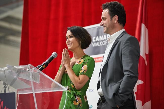 Marie-France Dubreuil and Patrice Lauzon, coaches of Olympic champion ice dancers Scott Moir and Tessa Virtue, speak about the pair at the ceremony to unveil Scott's star on Canada's Walk of Fame Hometown Stars at the arena in Ilderton, Ont., Wednesday, August 7, 2019. Montreal ice dance coaches Marie-France Dubreuil and Patrice Lauzon are giving figure skating fans something to watch. THE CANADIAN PRESS/ Geoff Robins