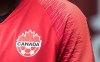 A Canada soccer logo is seen on Alphonso Davies in Vancouver, on Sunday March 24, 2019. Jamaica defeated Canada 3-1 Wednesday to win Group E at the CONCACAF Women's Under-20 Championship. THE CANADIAN PRESS/Darryl Dyck