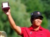 Albin Choi holds a medal after winning low amateur Canadian during final round play at the 2012 Canadian Open at the Hamilton Golf and County Club in Hamilton, Ont., on Sunday, July 29, 2012. As Toronto???s Albin Choi has recovered from an injured wrist he???s been working as a golf pro to keep his hand in the game. When Sungjae Im asked Choi to caddy at last week???s Honda Classic he was happy to help out a friend. But after Im won the PGA Tour event Choi is ready to ???retire??? as a caddy and return to the ranks of pro golf. THE CANADIAN PRESS/Nathan Denette