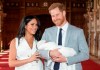 FILE - In this Wednesday May 8, 2019 file photo, Britain's Prince Harry and Meghan, Duchess of Sussex, during a photocall with their newborn son, in St George's Hall at Windsor Castle, England. A local mayor says Prince Harry and Meghan Markle chose the perfect place to rest and relax over the holiday season before announcing their decision to step back as senior members of the Royal Family. THE CANADIAN PRESS/Dominic Lipinski/Pool via AP, file)