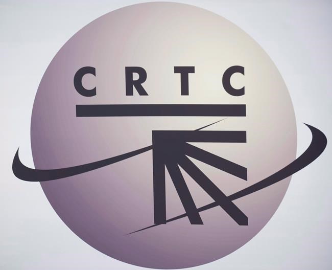 Canada's 10 largest internet service providers will be required to make their contract terms and pricing easier to understand under a new mandatory code of behaviour that went into effect Friday. A CRTC logo is shown in Montreal, Monday, Sept. 10, 2012. THE CANADIAN PRESS/Graham Hughes
