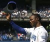 Toronto Blue Jays' Tony Fernandez tips his hat to the crowd as he takes part in a pre-game ceremony against the Tampa Bay Rays in Toronto Sunday September 23, 2001. Fernandez is in critical condition in a Florida hospital due to complications from a kidney disease. THE CANADIAN PRESS/Aaron Harris