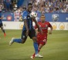 FC Dallas' Michael Barrios closes in on Montreal Impact's Ballou Tabla (left( during first half MLS action in Montreal on Saturday, July 22, 2017. Tabla's return to the Montreal Impact was made permanent Wednesday with the midfielder coming to terms on a two-year contract with two option years.THE CANADIAN PRESS/Peter McCabe