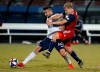 Vancouver Whitecaps' Erik Godoy (22) and FC Dallas midfielder Paxton Pomykal, right, compete for control of the ball during the second half of an MLS soccer match in Frisco, Texas, Wednesday, June 26, 2019. The Vancouver Whitecaps have made Erik Godoy's loan permanent, acquiring the Argentine centre back Club Atletico Colon. THE CANADIAN PRESS/AP-Tony Gutierrez