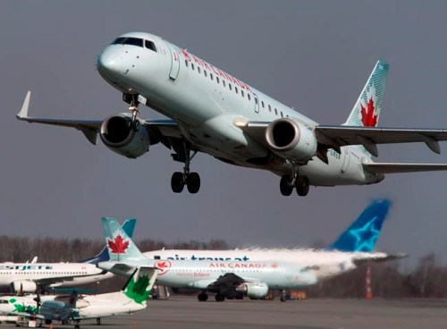 An Air Canada jet takes off from Halifax Stanfield International Airport in Enfield, N.S. on Thursday, March 8, 2012. A union official says Air Canada is laying off more than 5,000 flight attendants as the country's largest airline cuts routes and parks planes due to COVID-19. THE CANADIAN PRESS/Andrew Vaughan
