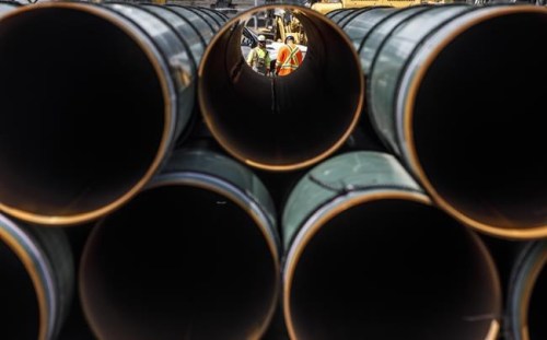 Pipe for the Trans Mountain pipeline is unloaded in Edson, Alta. on Tuesday June 18, 2019. The Federal Court of Appeal is set to release its decision on the latest challenge of the Trans Mountain pipeline expansion today. THE CANADIAN PRESS/Jason Franson