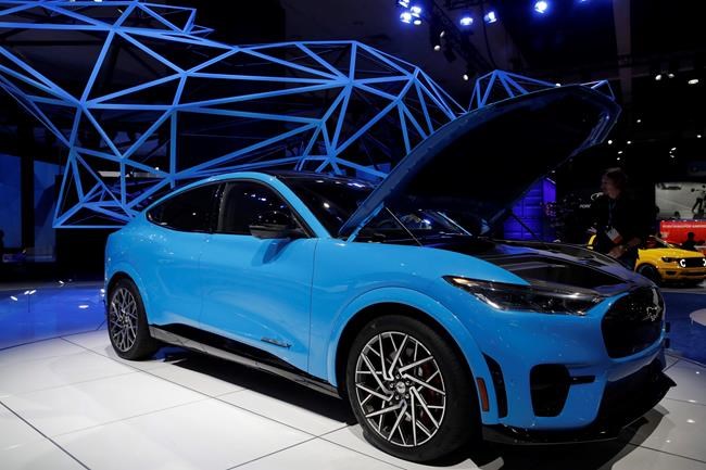 The 2021 Ford Mustang Mach-E electric SUV is shown at the AutoMobility LA auto show Thursday, Nov. 21, 2019, in Los Angeles. THE CANADIAN PRESS/AP, Marcio Jose Sanchez