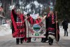 Chief Madeek (Jeff Brown), front left, hereditary leader of the Gidimt'en clan, and Wet'suwet'en Hereditary Chief Namoks (John Ridsdale), front right, carry a flag while leading a solidarity march after Indigenous nations and supporters gathered for a meeting to show support for the Wet'suwet'en Nation, in Smithers, B.C., on Wednesday January 16, 2019. THE CANADIAN PRESS/Darryl Dyck