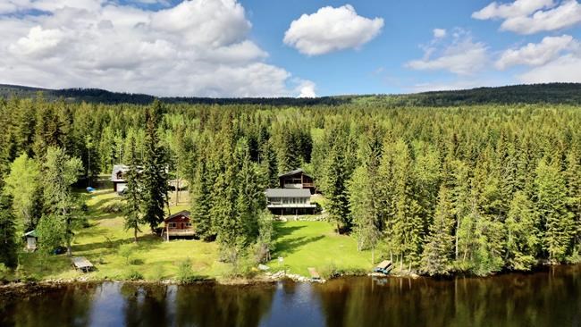 A waterfront house and carriage house on Timothy Lake, B.C. are shown in this recent handout image. THE CANADIAN PRESS/HO-RE/MAX-David Jurek *MANDATORY CREDIT*