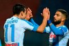 Napoli's Hirving Lozano, left, celebrates with Lorenzo Insigne after scoring during the Serie A soccer match between Crotone and Napoli, at the Ezio Scida Stadium in Crotone, Italy, Sunday, Dec. 6, 2020. (Francesco Mazzitello/LaPresse via AP)